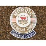 A Morris Authorised Dealer circular enamel sign, faded, 28 1/2" diameter, with curved double sided