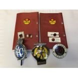 A selection of car badges to include early RAC and Caravan Club, also several miniature Caravan Club