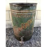 An early Wakefield Castrol Motor Oil five gallon embossed can with dispensing tap.