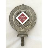 A Royal Automobile Club Associate car badge with Junior Car Club enamel centre, no. 8254.