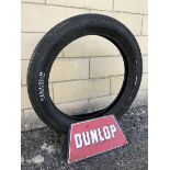 A Dunlop forecourt folding tyre stand with a Dunlop tyre for display purposes only.