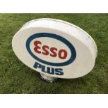 An Esso Plus plastic petrol pump globe.