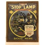 A rare 'Stop' lamp pictorial showcard advertisement depicting a busy crossroads junction at night