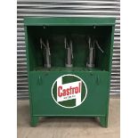 A Castrol Motor Oil three pump forecourt oil cabinet with circular advertising sign to the front.