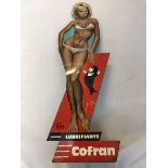 A Cofran Oils pin-up girl radiator tin sign, 20 1/2" tall.