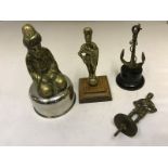 Four assorted car accessory mascots including an anchor, indistinct stamp: Angus Sydney.