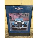 A framed and glazed print of a Lagonda V12 Rapide of 1939, 20 x 28".