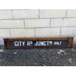 An Edwardian oak cased tram destination sign with brass mounts.