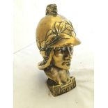 A Minerva car accessory mascot, polished brass with traces of nickel plate.