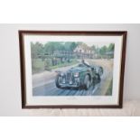 A framed and glazed print titled 'Spa Special' depicting Jock St. John Horsfall's Aston Martin at