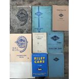 A collection of Riley 9 instruction books and related volumes.