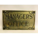 A rectangular brass plaque for 'Manager's Office', 10 x 6".