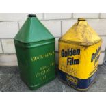 A Golden Film Superior Lubricants five gallon can and one other for Duckhams.