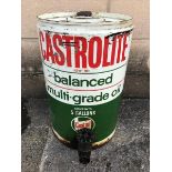 A Castrol Balanced Multi-Grade Oil five gallon drum.