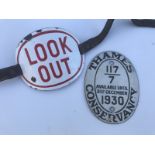 An enamel 'Look Out' oval armband with straps for attaching to the arm and a 1930 Thames Conservancy