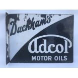 A Duckham's Adcol Motor Oils double sided enamel sign with hanging flange by Bruton of Palmers