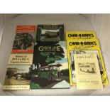 A collection of assorted volumes, some Ferrari related and a box of Bugantics etc.