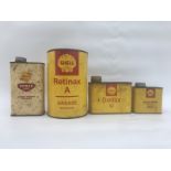 Four assorted Shell oil and grease cans.