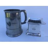 A pewter tankard with Shell emblem to one side, possibly Aeroshell and an Esso ashtray.