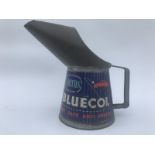 A Smiths Bluecol pint oil measure, in good condition.