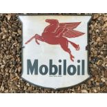 A Mobiloil shield shaped enamel sign with flying Pegasus dated 1953, 15 x 15".