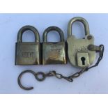 Three assorted Regent padlocks .