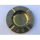 A BP Motor Spirit embossed brass ashtray.