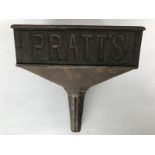 A Pratt's rectangular funnel with embossed lettering.