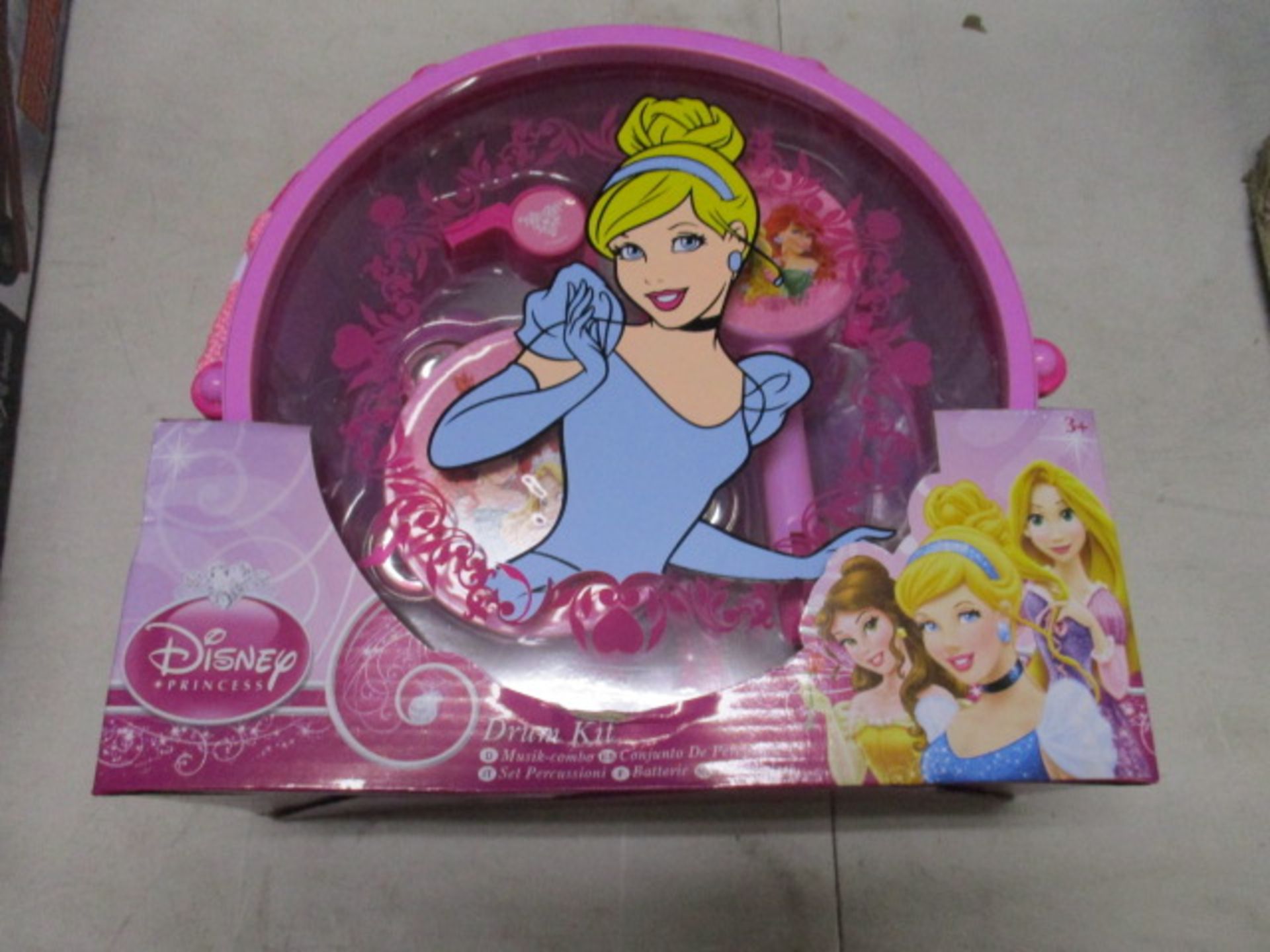 New and sealed Disney princess drum set contains drum and sticks , flute, castanets, tambourine,