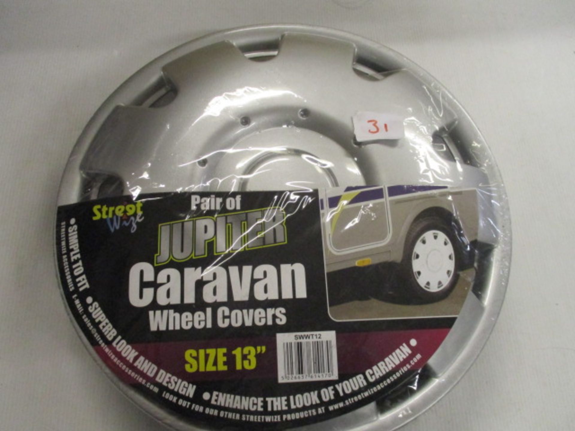 1 pair unopened unused 13" wheel covers