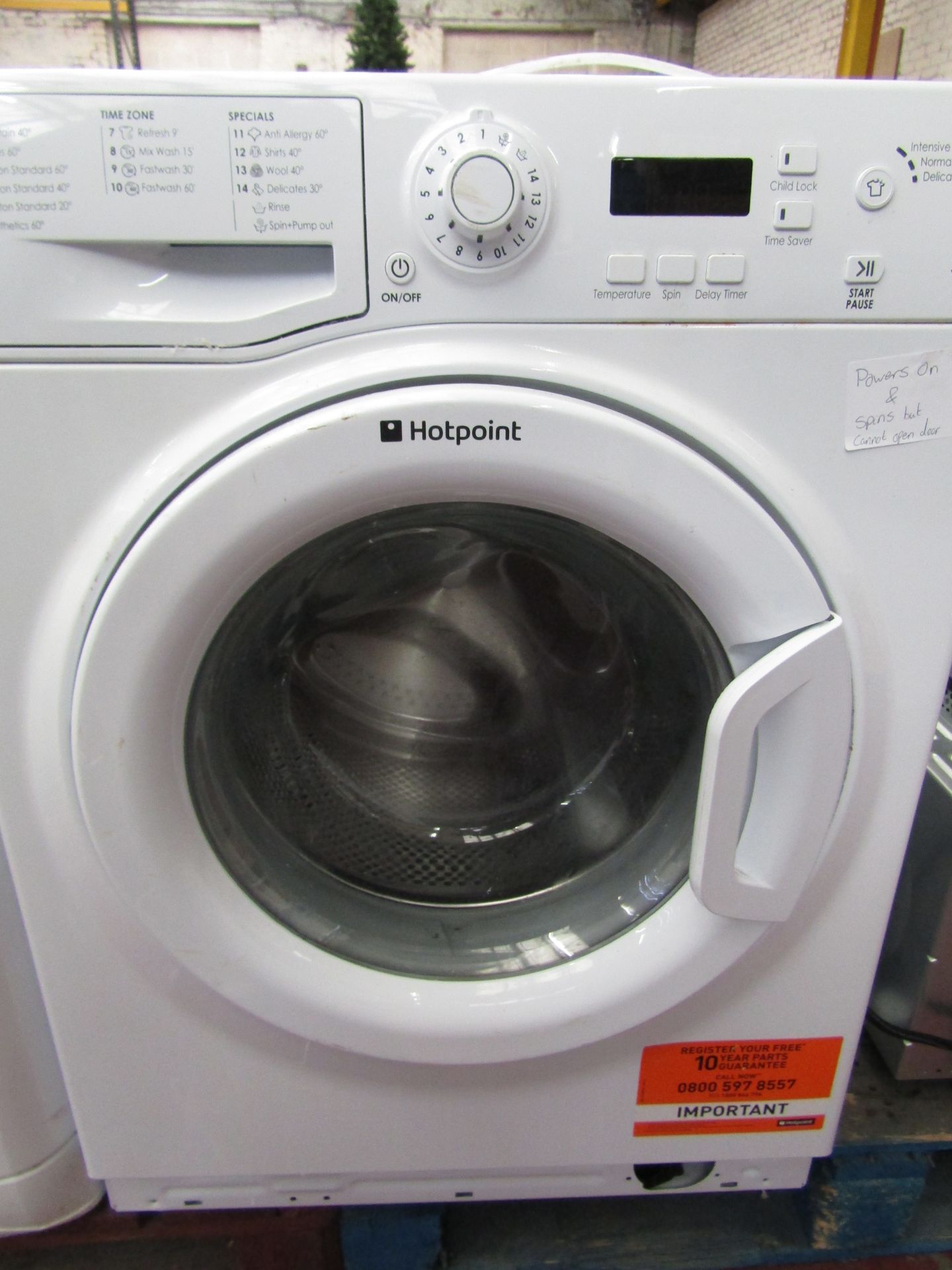 Hotpoint WMXTF 942 washing machine, powers up and spins but cannot open door, may be locked due to