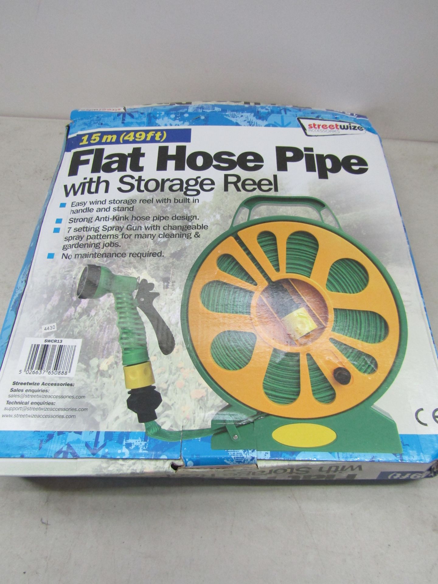 15M Flat hose pipe with storage reel, unused and boxed.