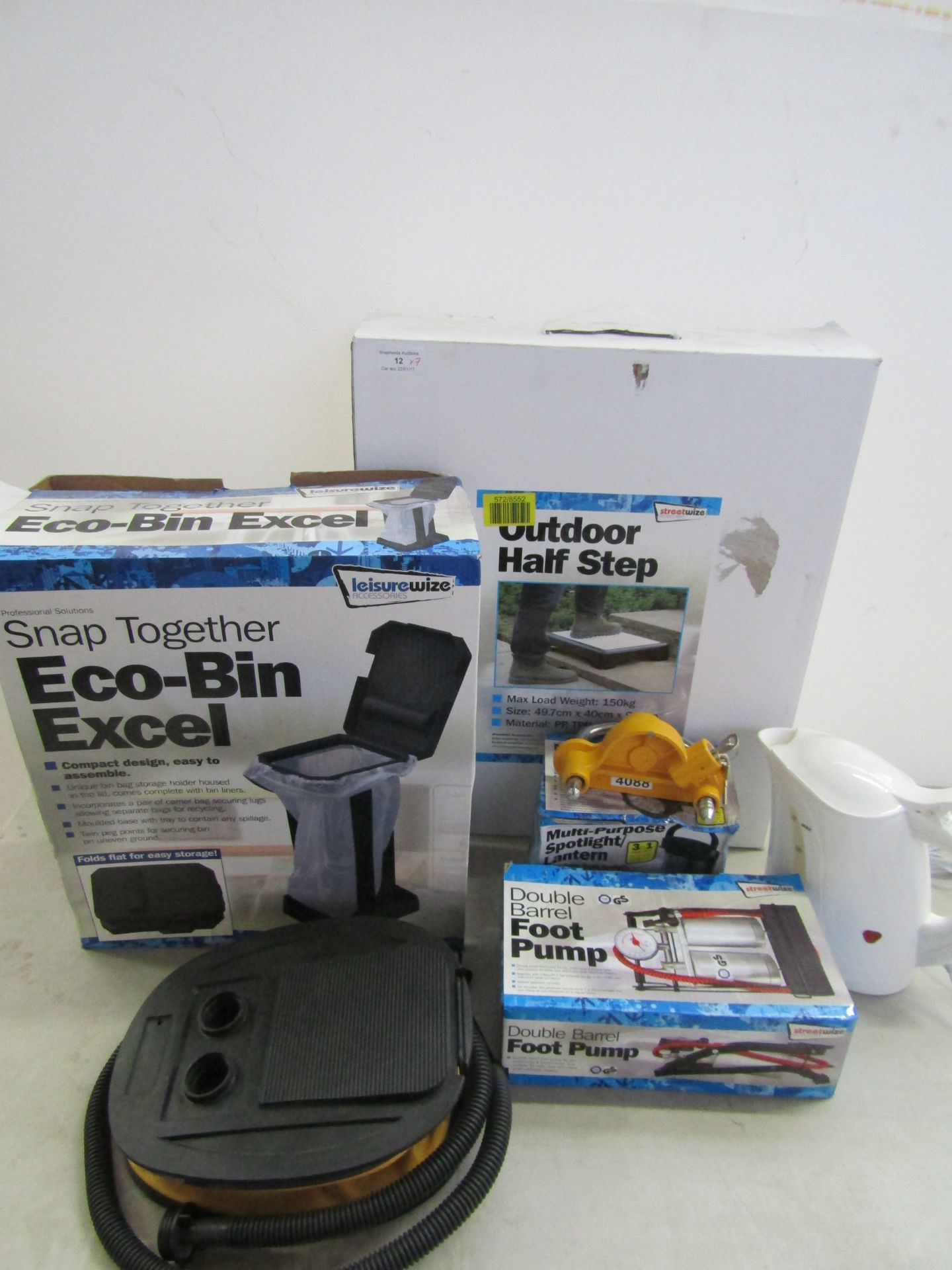 7x Items being; Multi Purpose Spot Light, Hitch Lock with keys, Eco Bin Excel, Foot Pump, 12v