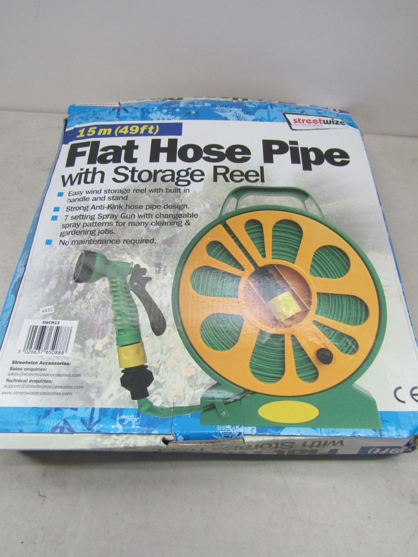 15M Flat hose pipe with storage reel, unused and boxed.