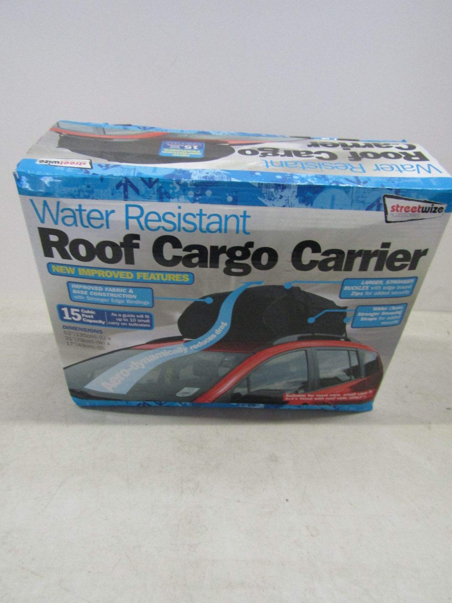 Water resistant roof cargo carrier, unused and boxed.