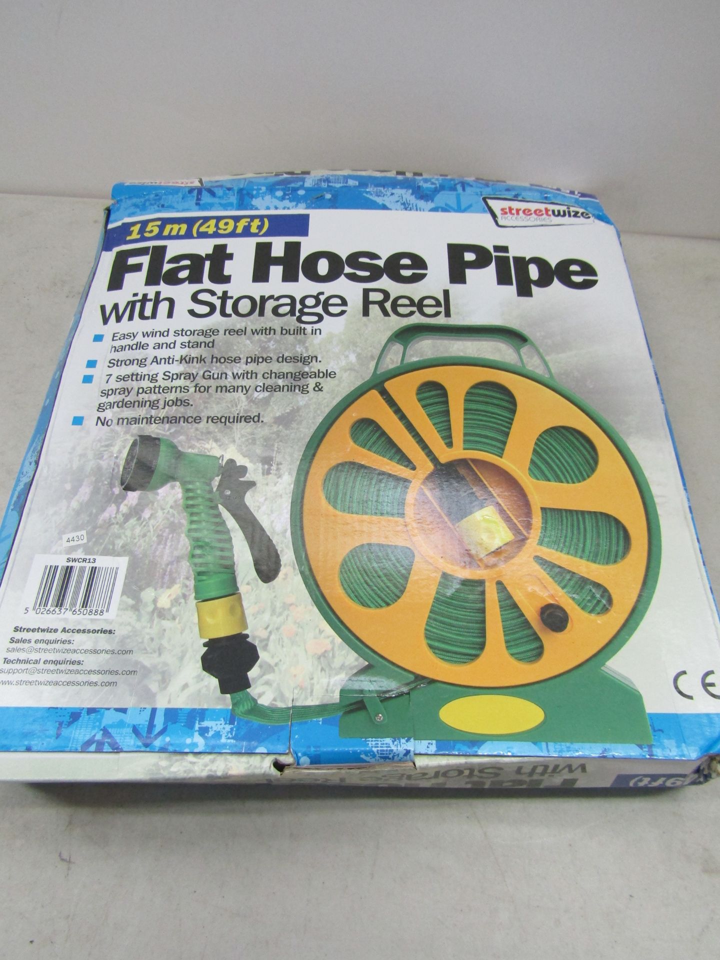 15M Flat hose pipe with storage reel, unused and boxed.