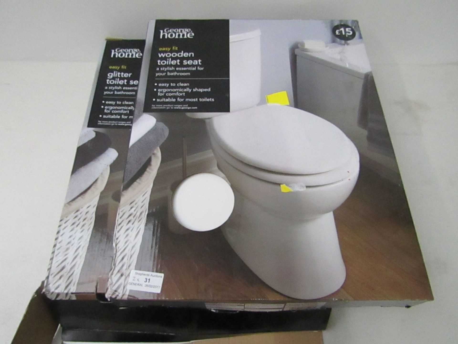 2 items being, George home wooden toilet seat unchecked and boxed, George home glitter toilet seat