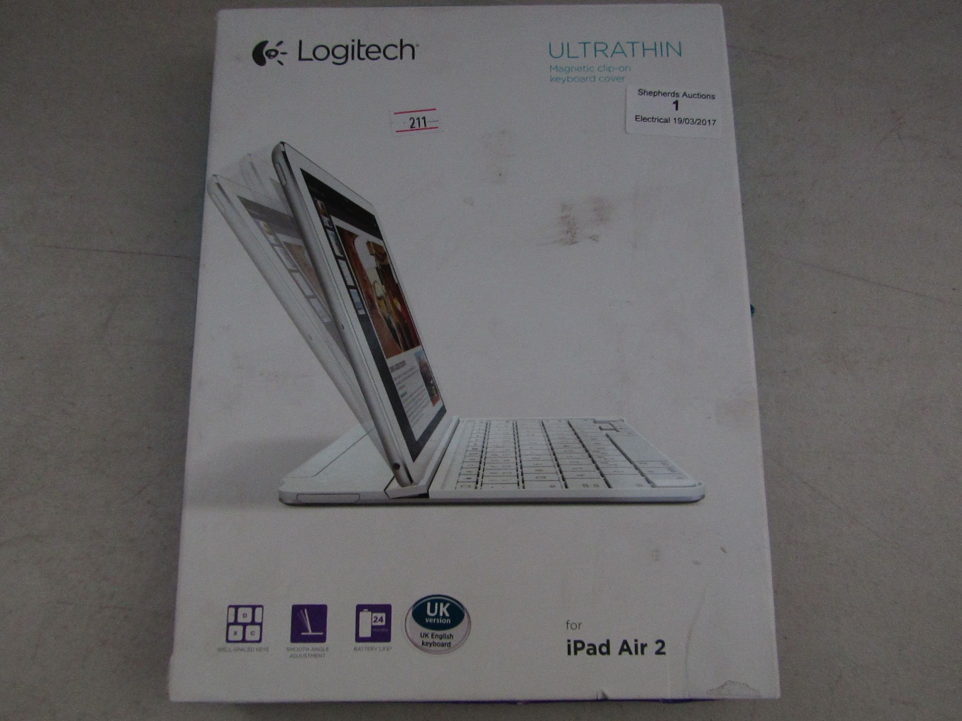 Logitech ultrathin magnetic clip-on keyboard cover for the Ipad Air 2, tested working and boxed.