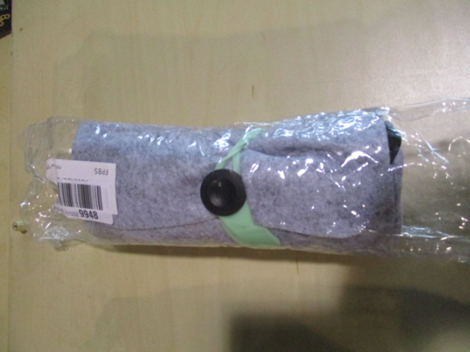 Mini umbrella green unused in packaging