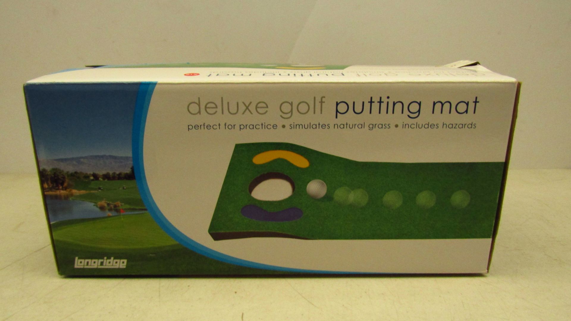 Deluxe gold putting mat, stimulates natural grass including hazards. Unchecked and boxed.