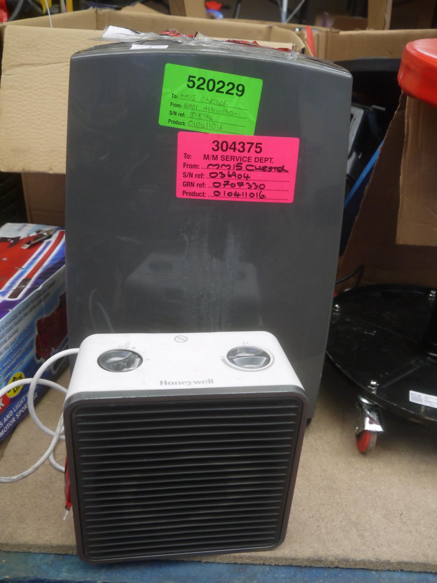 Duracraft dehumidifier and Honeywell heater, both are customer returns, unchecked.