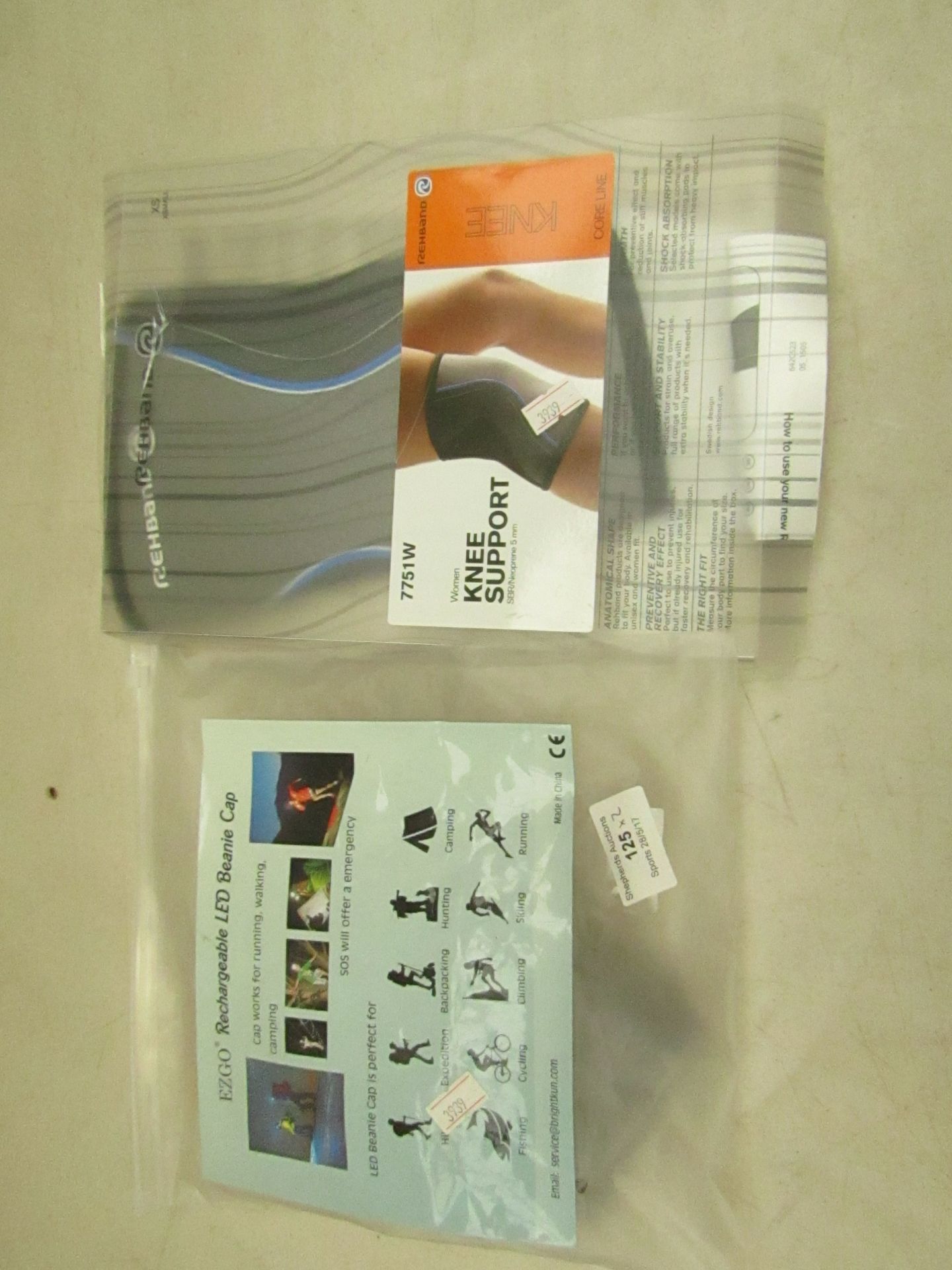 This lot contains  - Knee support.  - Rechargable LED beanie cap.