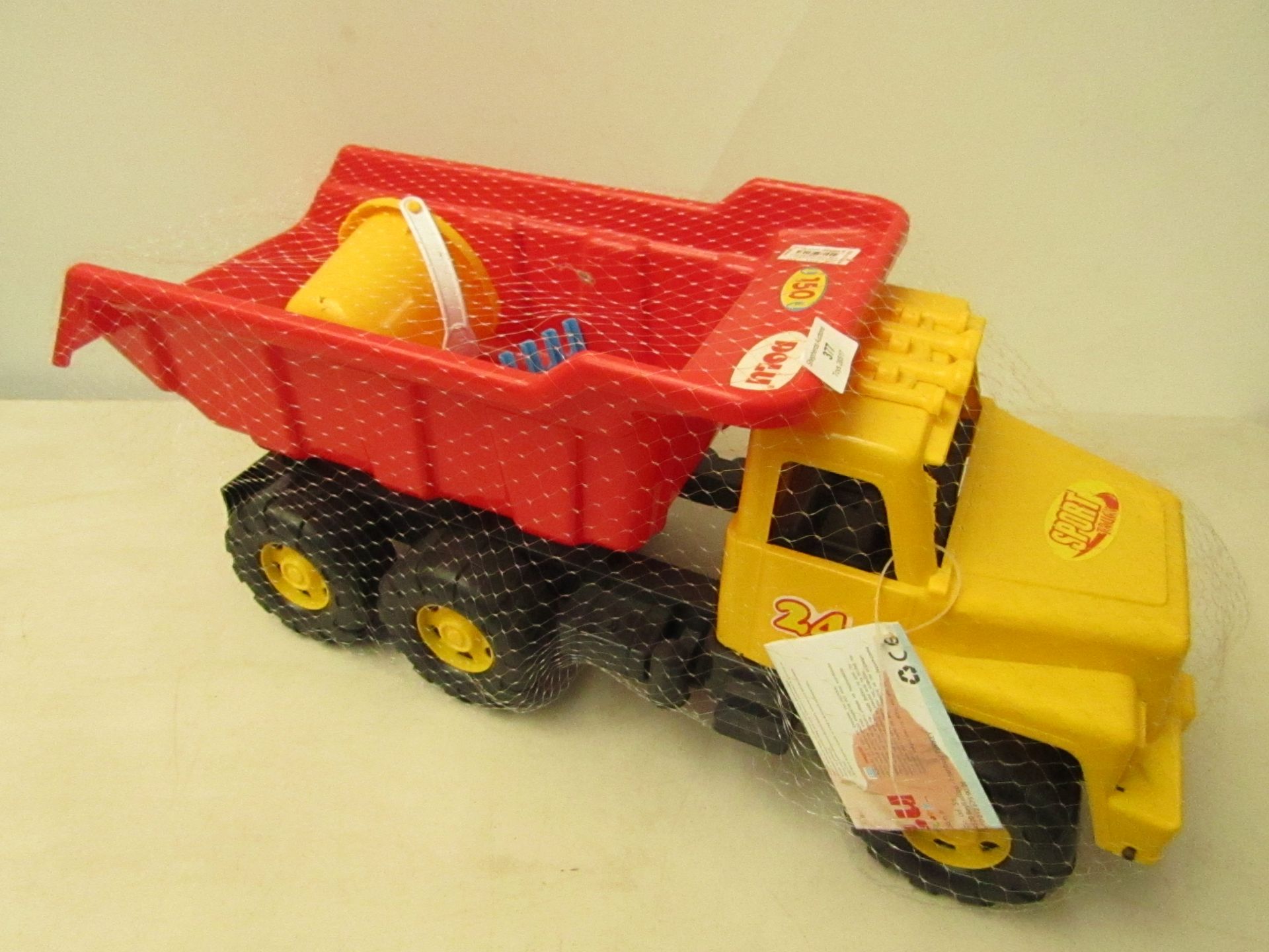 Sport truck with bucket and spade, new in packaging.