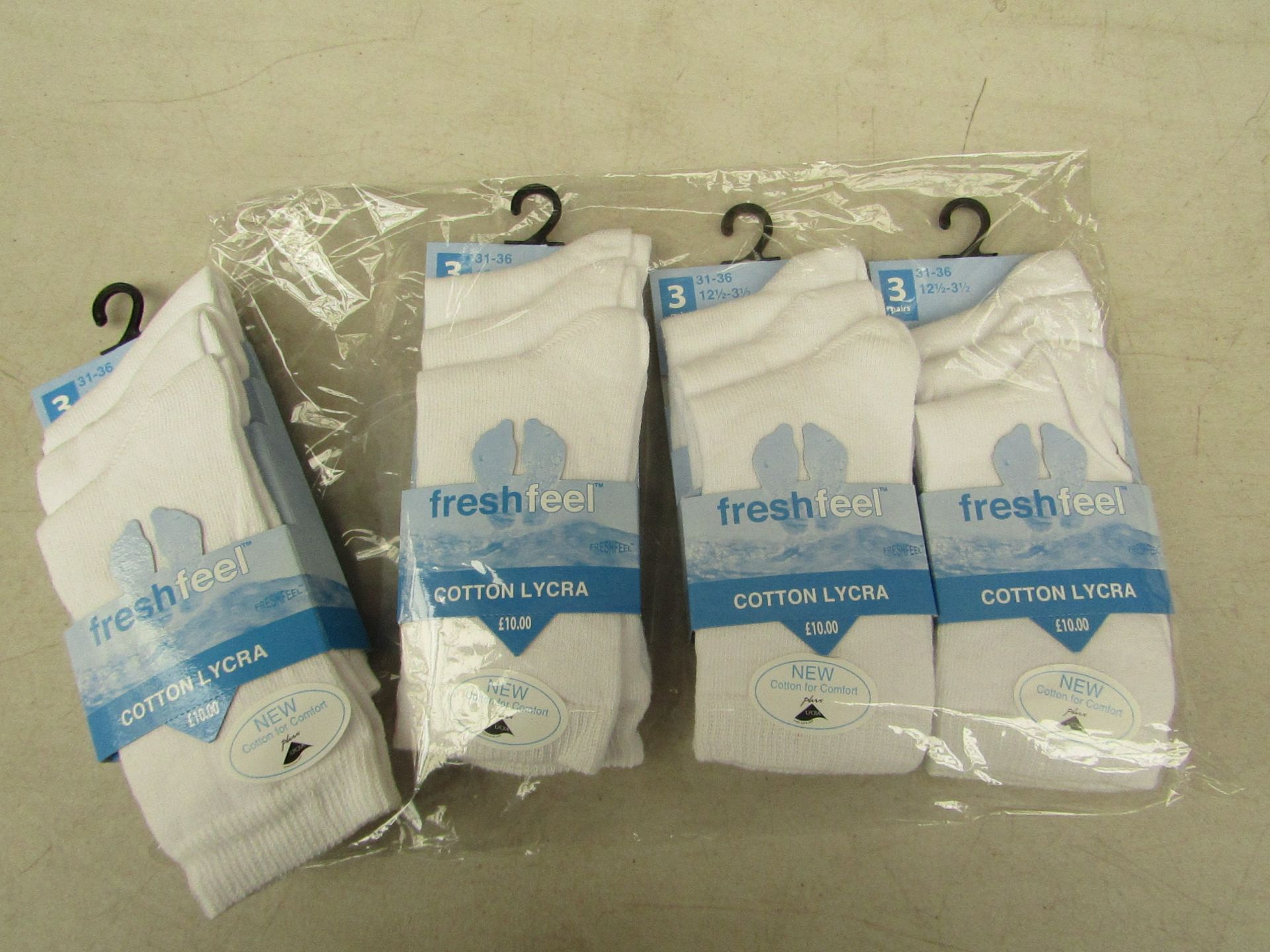 4 PKS of 3 white Cotton Lycra socks,size 12-1/2 to 3-1/2, new in packaging
