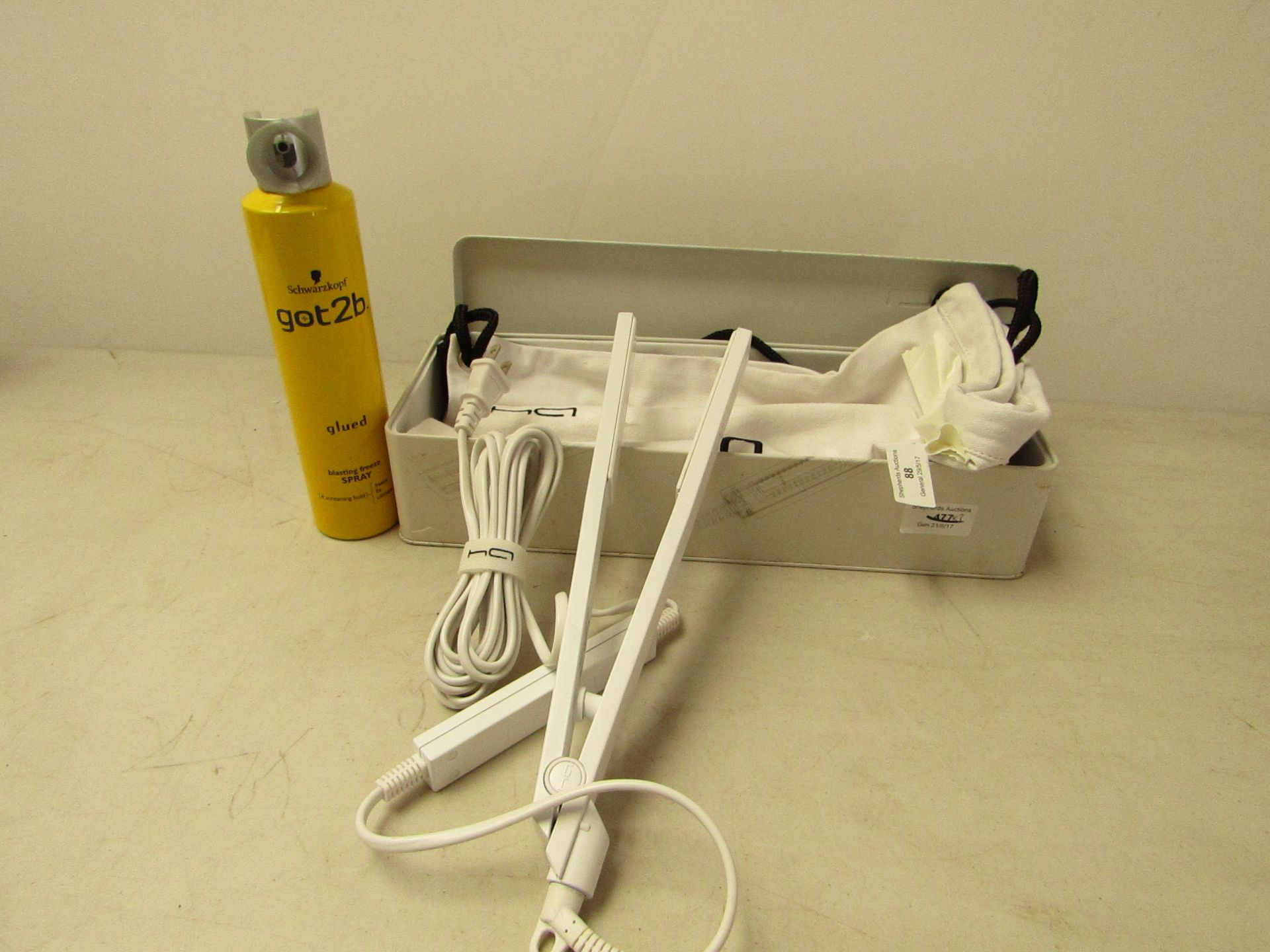 HAir set of hair straighteners and a 300ml can of Schwarzkopf got2b freeze sray.