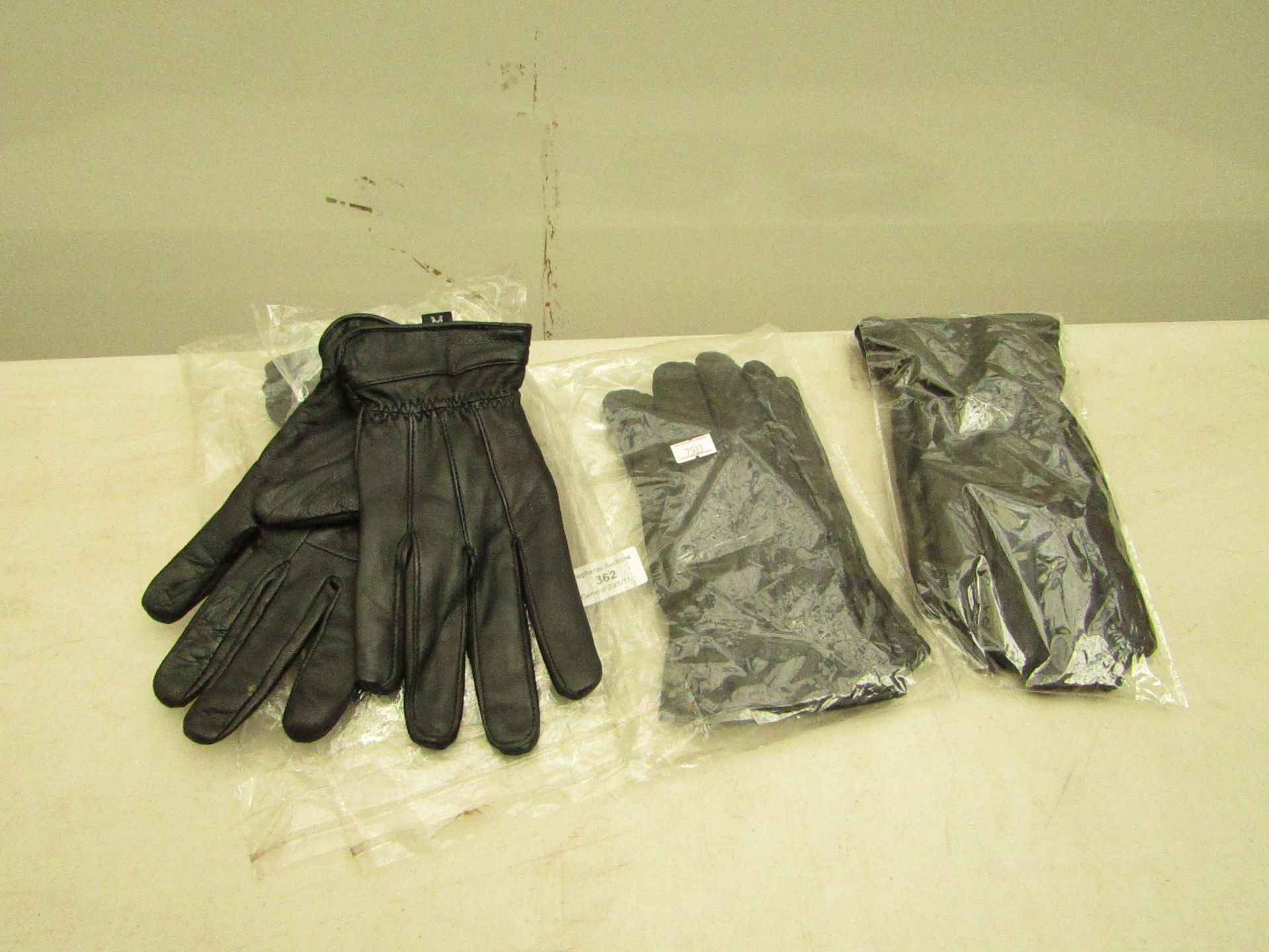 4x pair M women leather gloves, all in packaging.