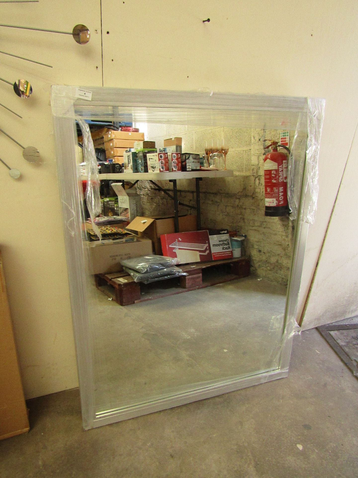 Large rectangular mirror with silver colour frame, size 109cm x 84cm.