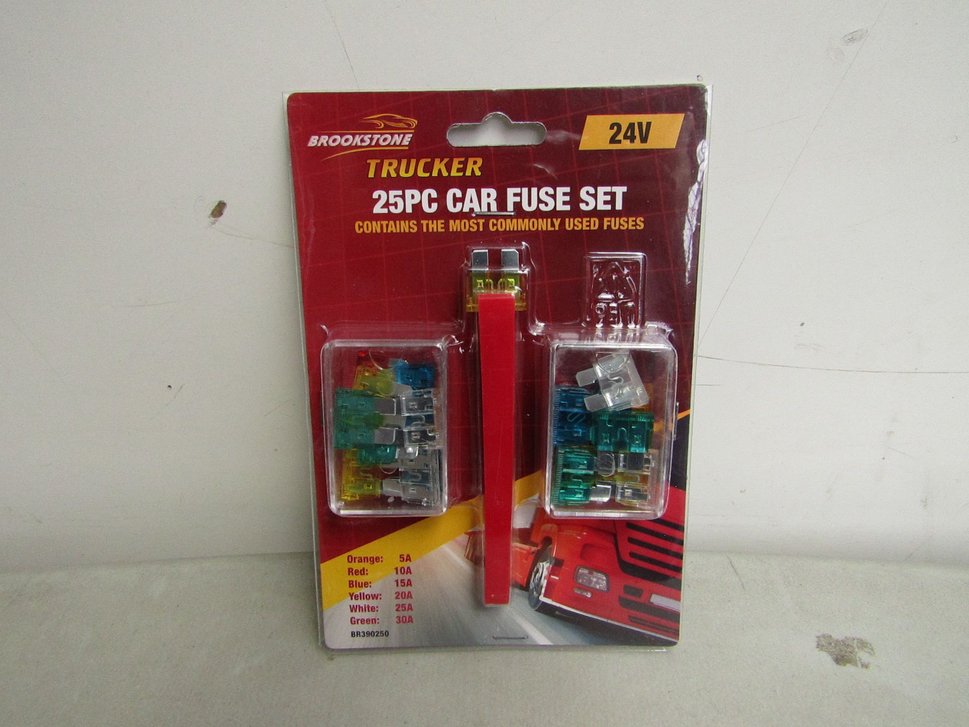 Approximately 41x Brookstone trucker 25pc car fuse set, new in packaging.