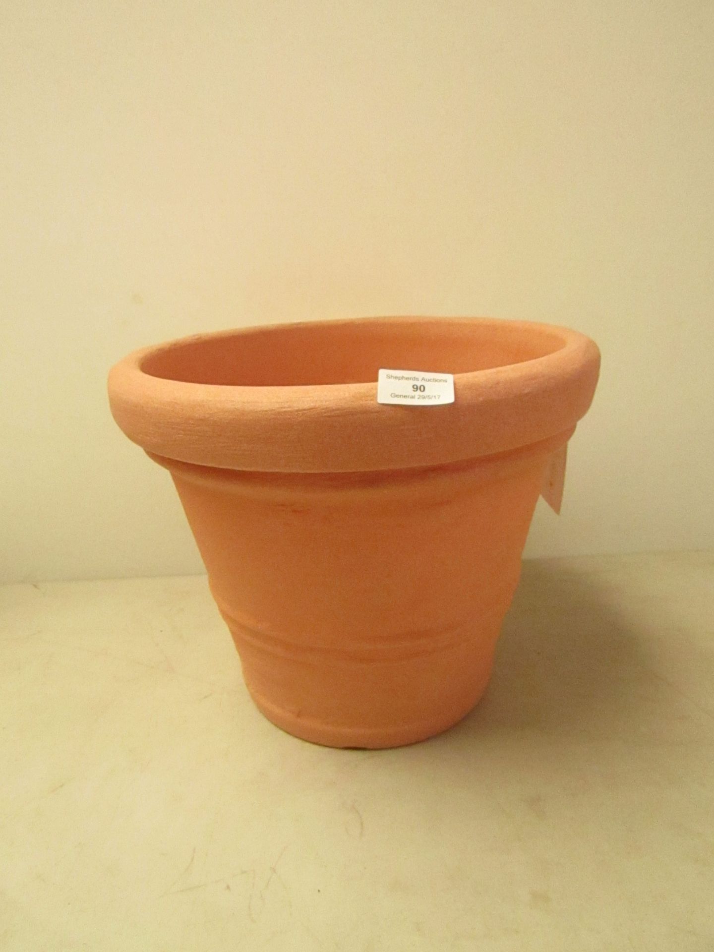 Scheurich plant pot, plastic, with tags.