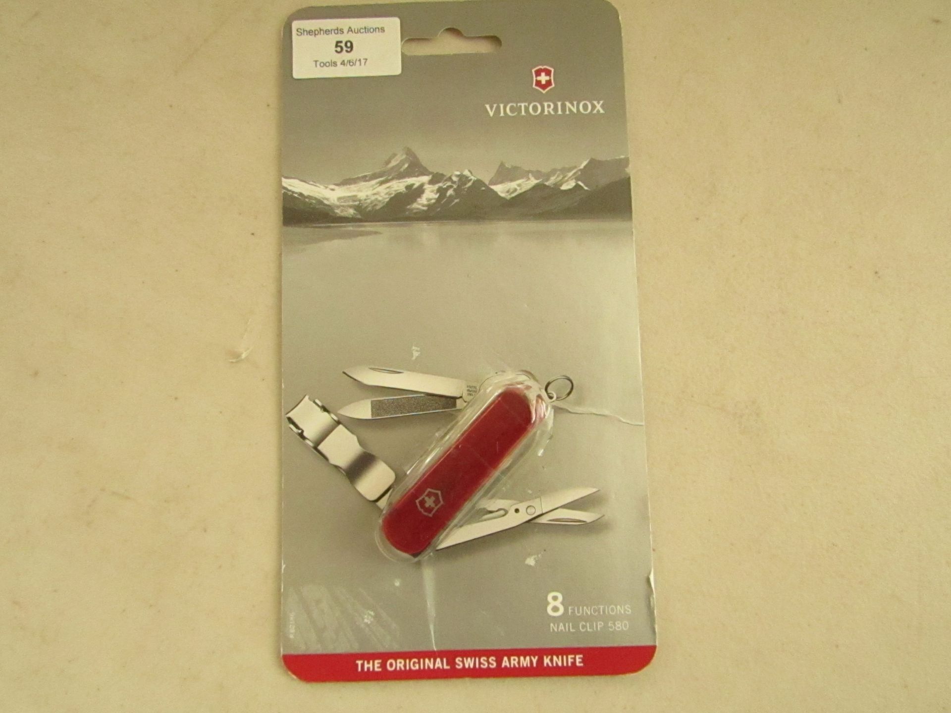 Victorinox original mini swiss army knife, spartan red colour in packaging.